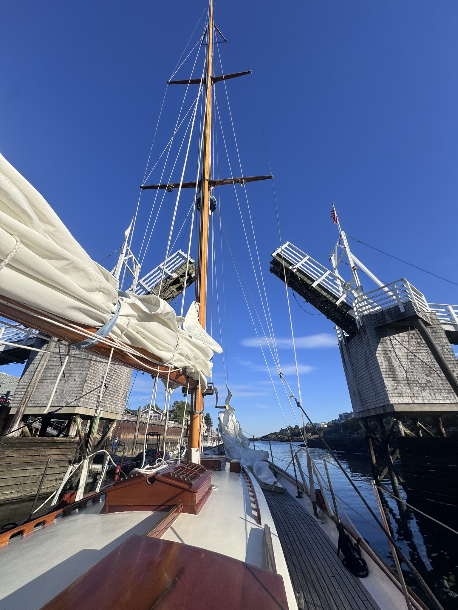 Sailing out through the drawbridge in Maine