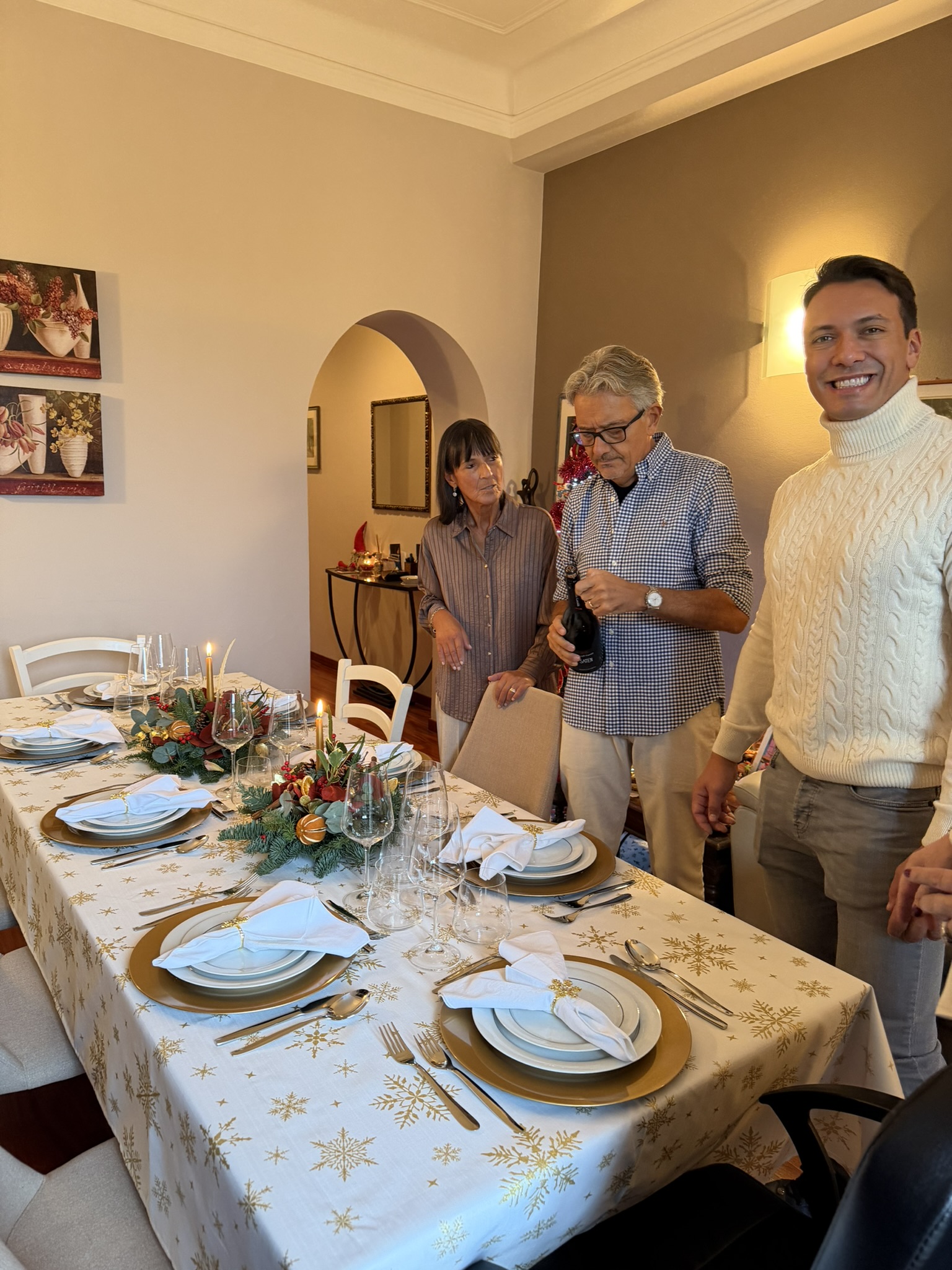 Setting the table and opening a bottle for the holiday dinner