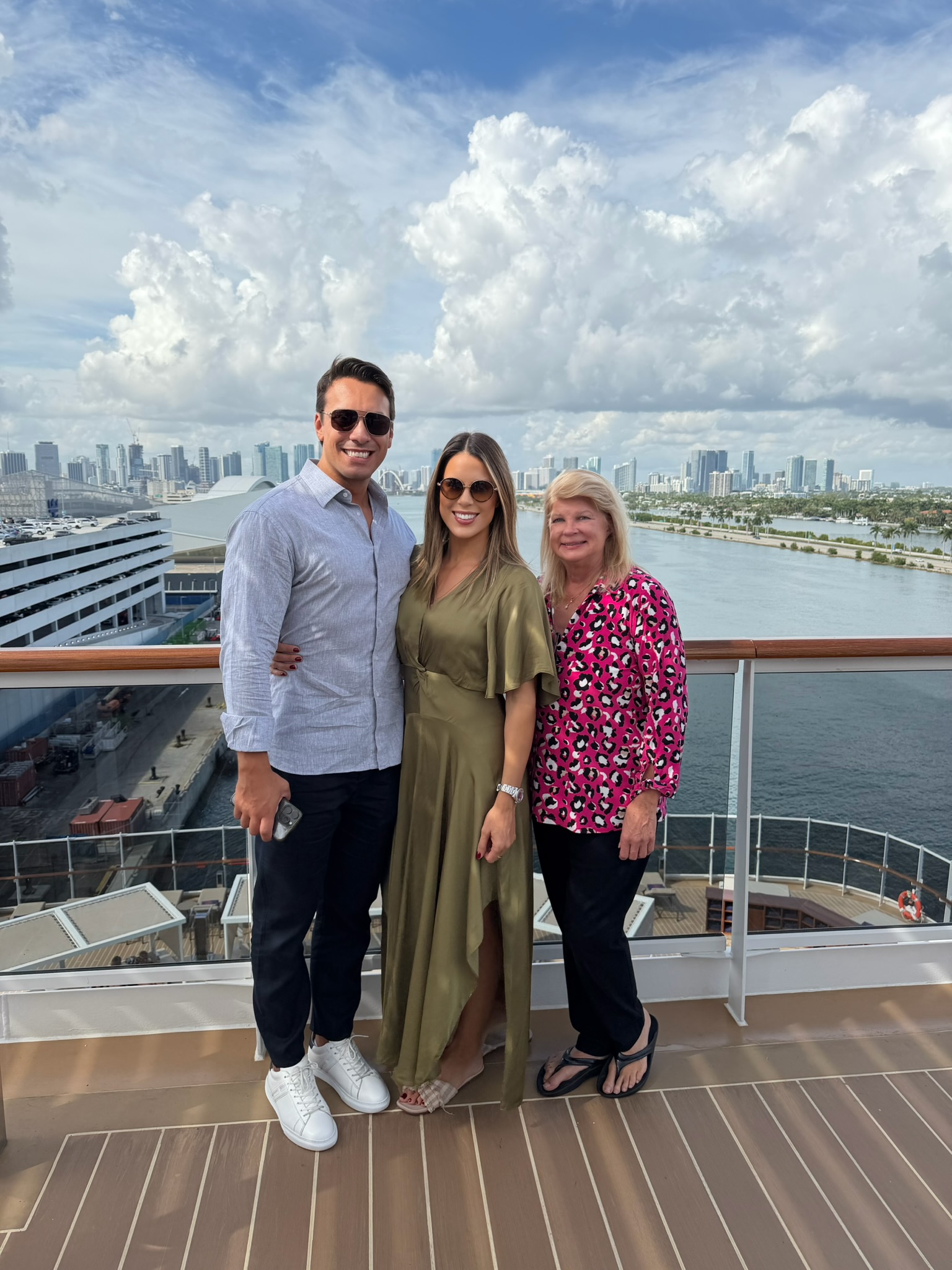 On deck with family, Miami skyline behind