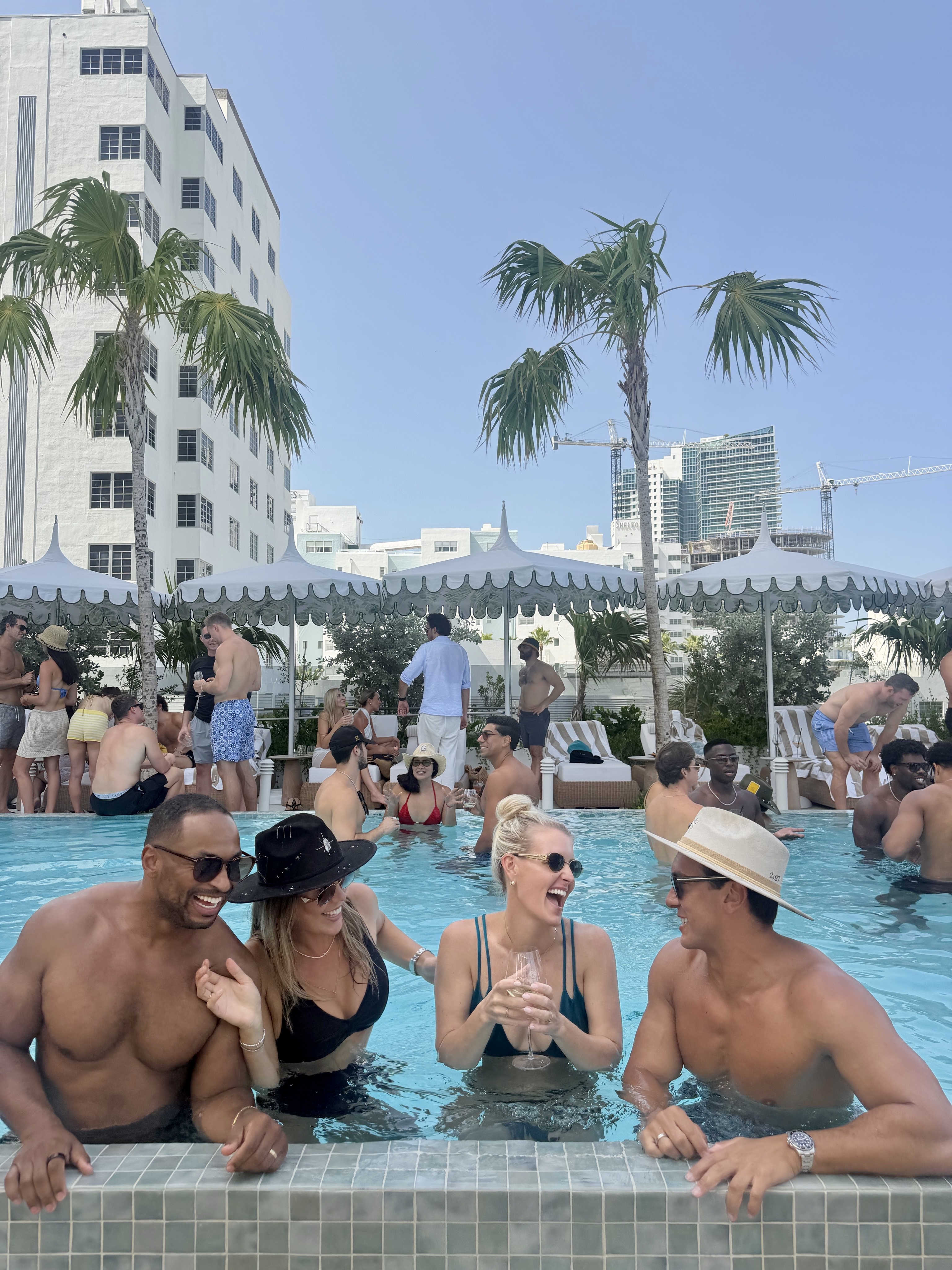 A rooftop pool party with friends in Miami
