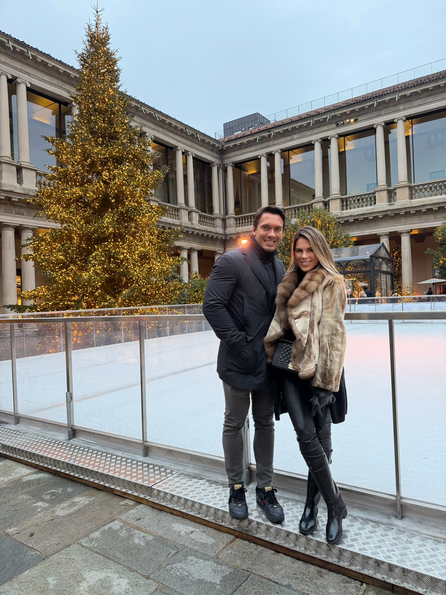 By the ice rink and the Christmas tree in Milan