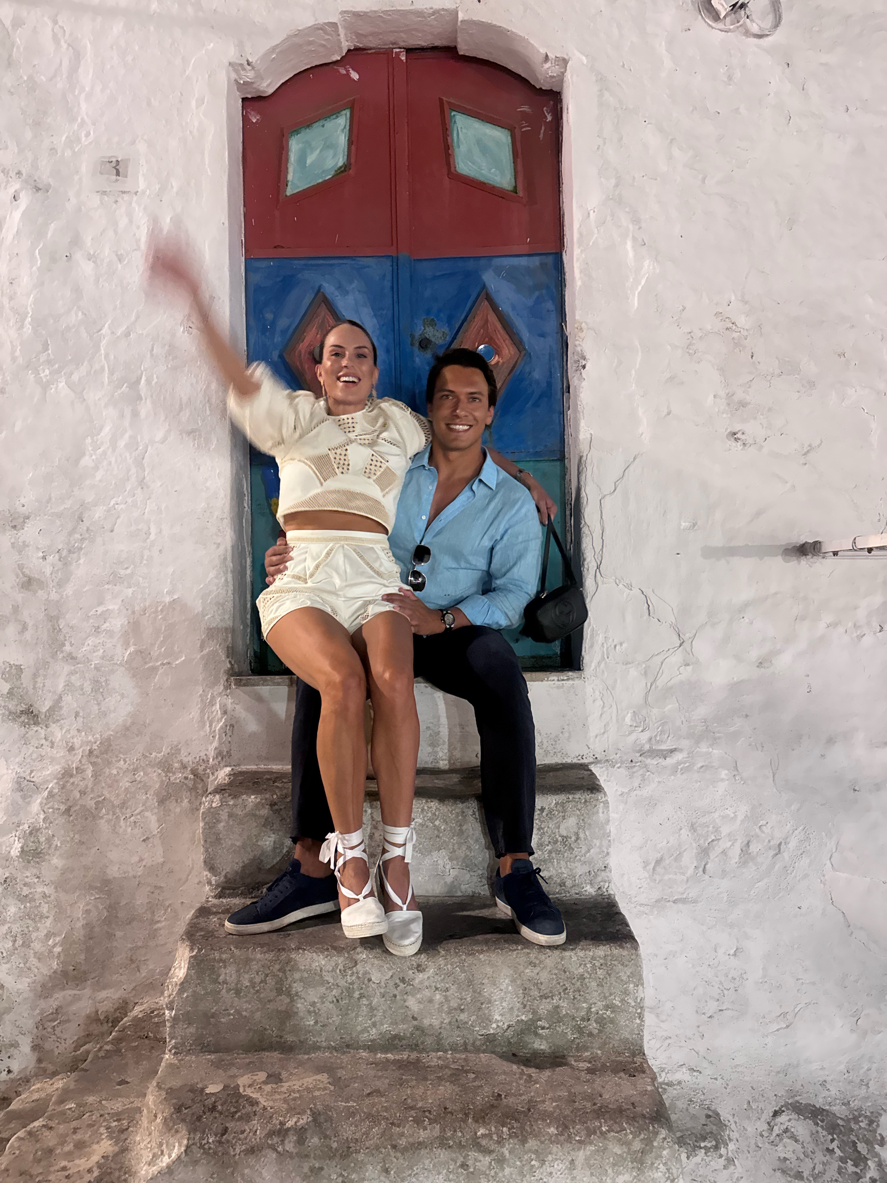 Perched in a doorway in Polignano a Mare