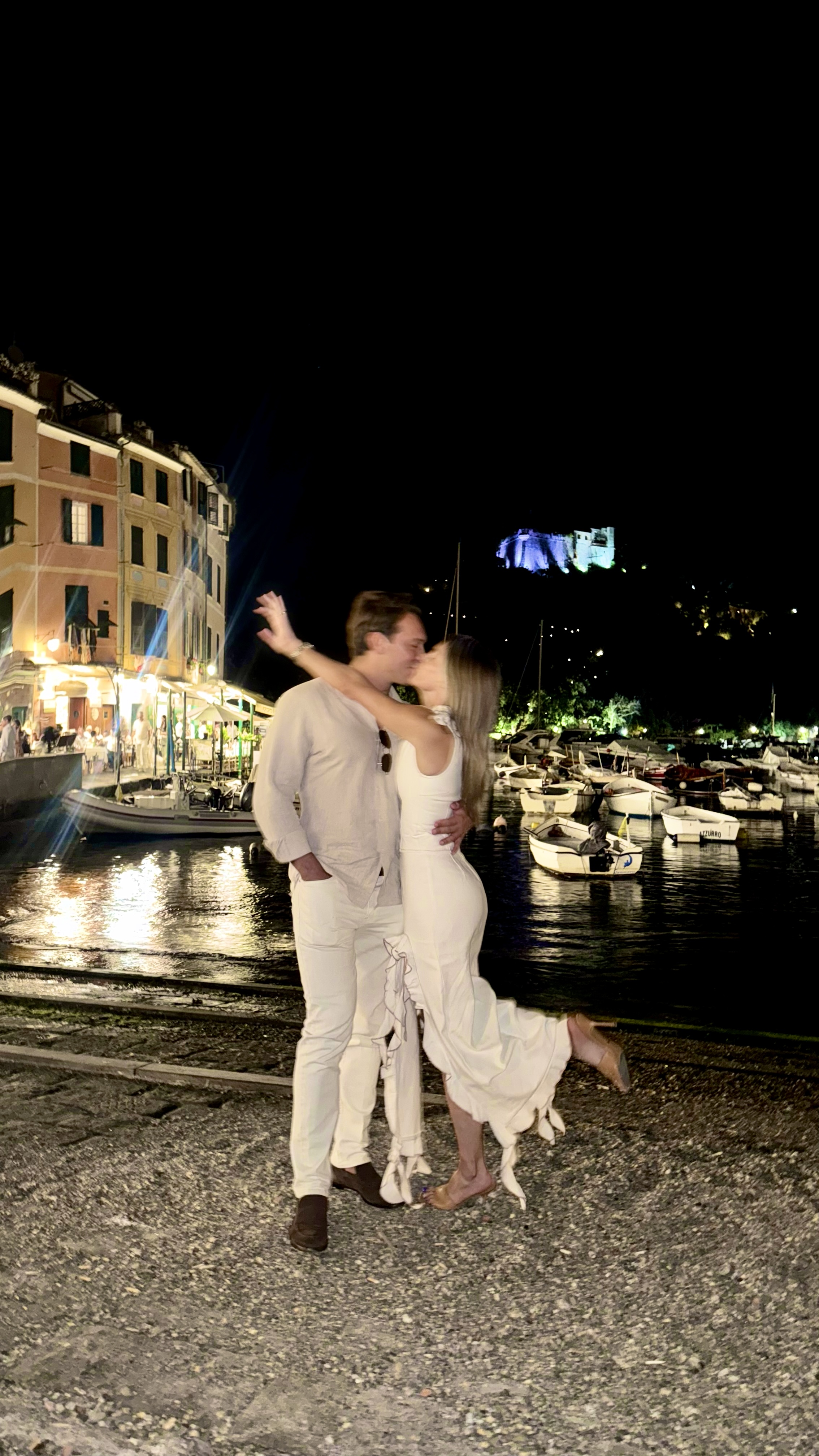 A kiss by the harbor in Portofino