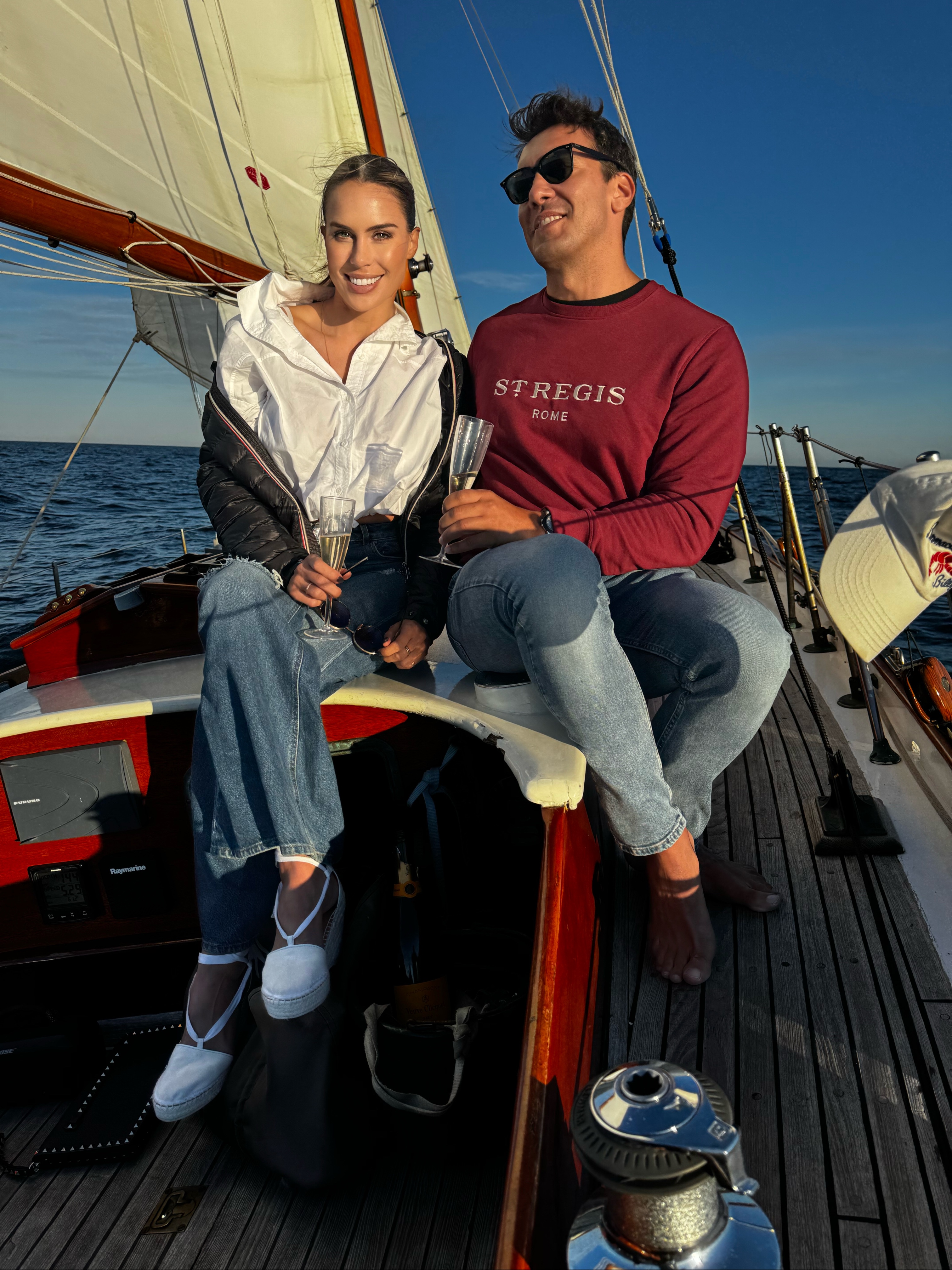 Champagne aboard a sailboat